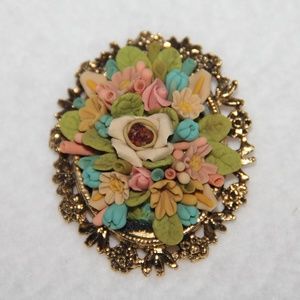 Molded Celluloid Flower Bouquet Brooch